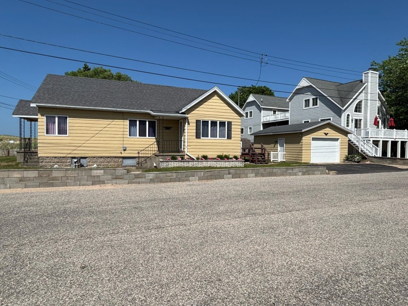 Rare Lake Michigan Mid-Century Gem! This cottage offers - Beach Home for sale in Manistee, Michigan on Beachhouse.com