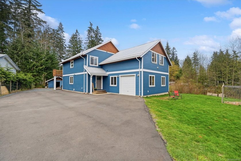 Enjoy the ultimate rural lifestyle on this sun-drenched - Beach Home for sale in Black Creek, British Columbia on Beachhouse.com