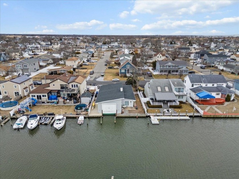 This one-of-a-kind waterfront home offers stunning views and - Beach Home for sale in Lindenhurst, New York on Beachhouse.com