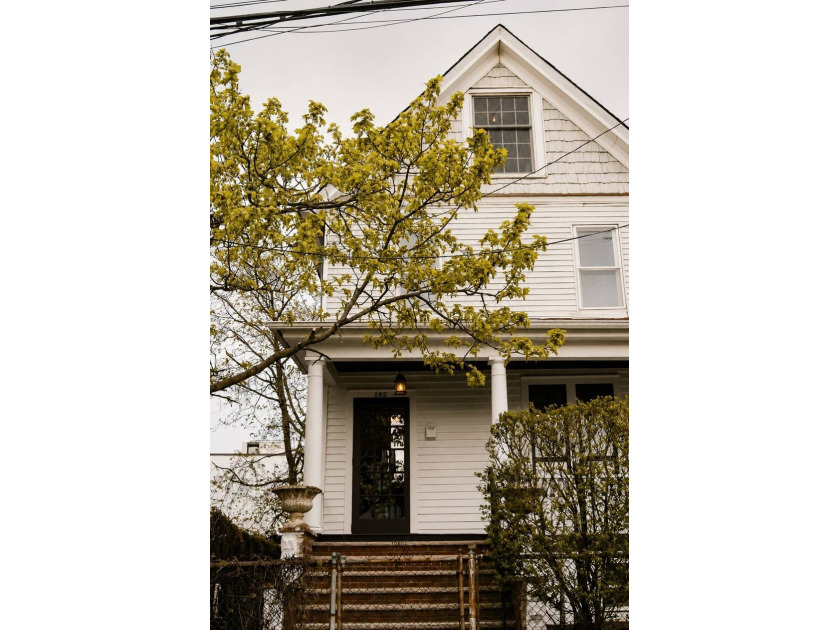 Fifty minutes from Midtown. Half a block from the Atlantic. This - Beach Home for sale in Rockaway Beach, New York on Beachhouse.com