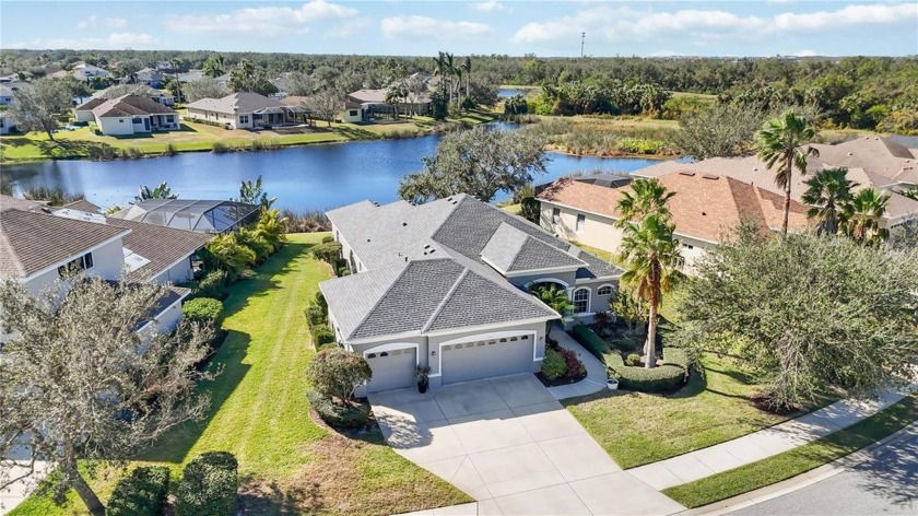 Highly sought-after Greyhawk Landing Lakefront home featuring - Beach Home for sale in Bradenton, Florida on Beachhouse.com