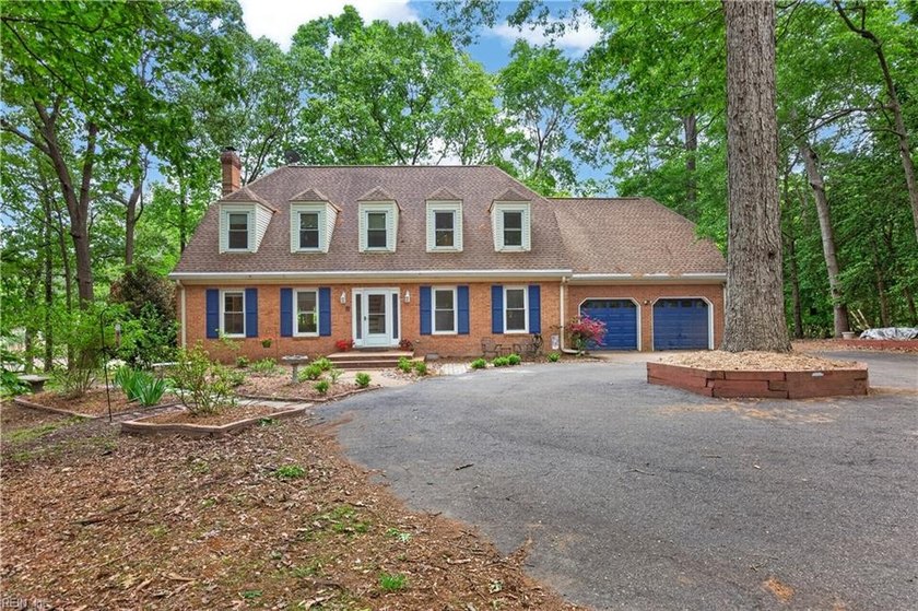 Welcome home to this gorgeous all-brick Colonial on a large - Beach Home for sale in Carrollton, Virginia on Beachhouse.com