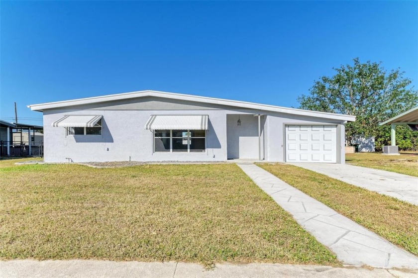 Charming 2-bed, 1-bath home, freshly painted with brand-new - Beach Home for sale in Port Charlotte, Florida on Beachhouse.com