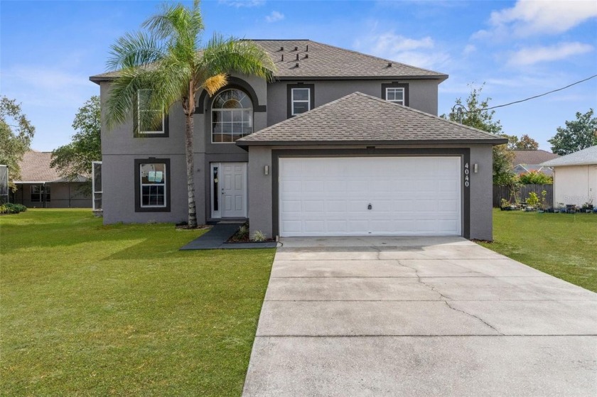 Level up with this newly renovated 4/2.5 2 car garage, pool home - Beach Home for sale in Spring Hill, Florida on Beachhouse.com