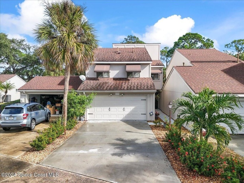 Tucked away on Turtle Creek Golf Course is your new two-story - Beach Townhome/Townhouse for sale in Rockledge, Florida on Beachhouse.com