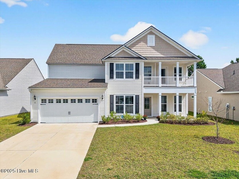 Discover this beautiful 4-bedroom, 2.5-bath home in the highly - Beach Home for sale in Calabash, North Carolina on Beachhouse.com
