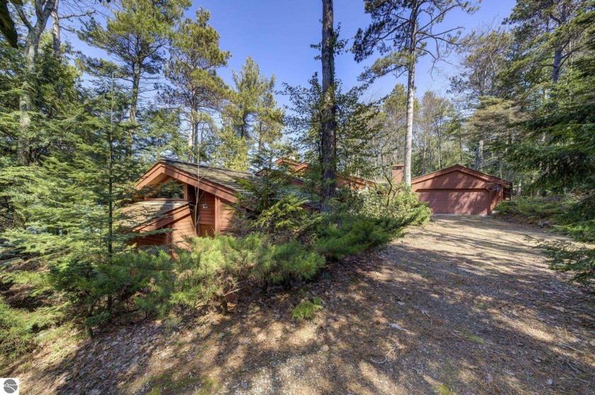 Inspired, retreat tucked away on a private 0.47-acre setting - Beach Home for sale in Leland, Michigan on Beachhouse.com