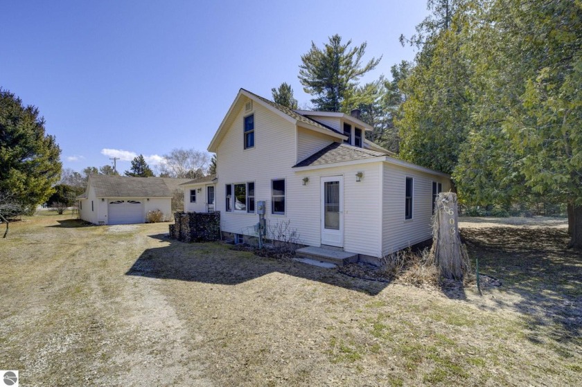 This 2-bedroom, 1-bathroom home is ideally situated just a short - Beach Home for sale in Leland, Michigan on Beachhouse.com