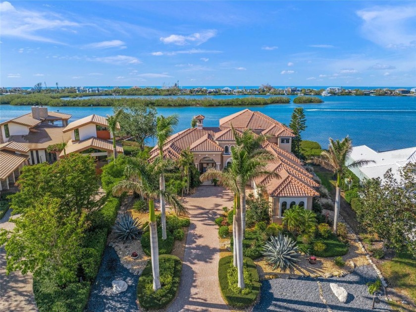 This stunning waterfront residence in Southbay Yacht and Racquet - Beach Home for sale in Osprey, Florida on Beachhouse.com