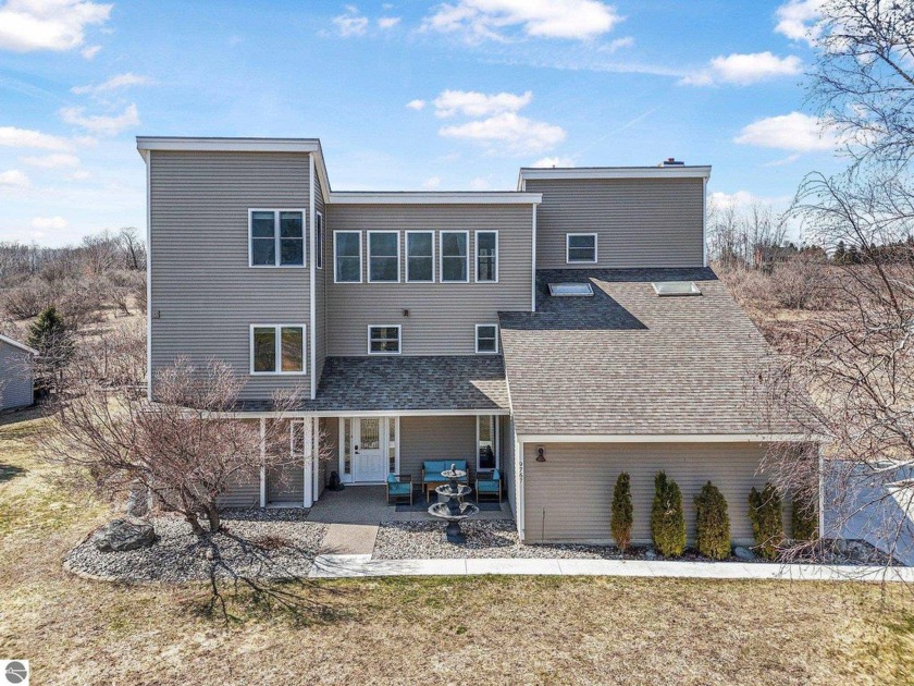 Don't miss this stunning modern home nestled on the highly - Beach Home for sale in Traverse City, Michigan on Beachhouse.com