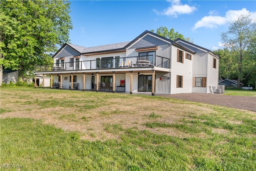 Welcome to your dream retreat on the shores of Lake Erie-a rare - Beach Home for sale in Geneva, Ohio on Beachhouse.com