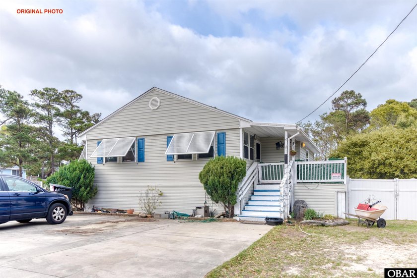 Charming one-story home nestled on a picturesque street in the - Beach Home for sale in Kill Devil Hills, North Carolina on Beachhouse.com