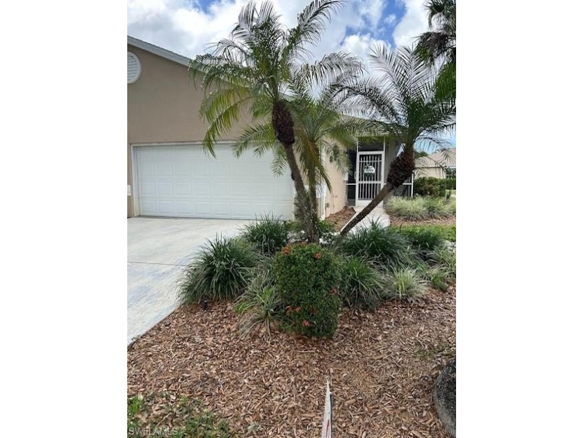 This villa backs to the 9th hole. This 2 bedroom-2bath 2- car - Beach Home for sale in Estero, Florida on Beachhouse.com