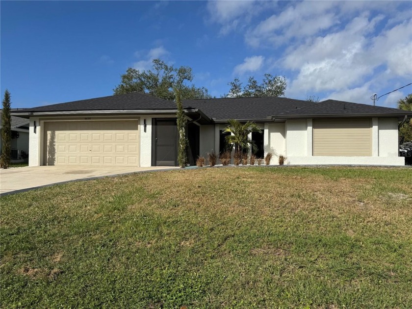 This waterfront home is stunningly fully  updated inside and out - Beach Home for sale in Port Charlotte, Florida on Beachhouse.com