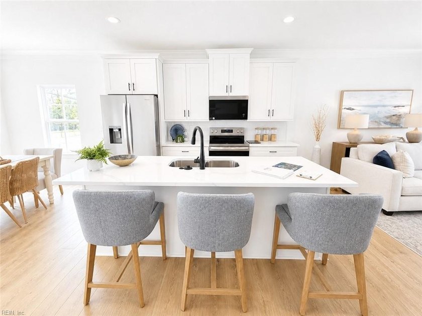 Welcome to this stunning three-bedroom home, where each bedroom - Beach Townhome/Townhouse for sale in Virginia Beach, Virginia on Beachhouse.com