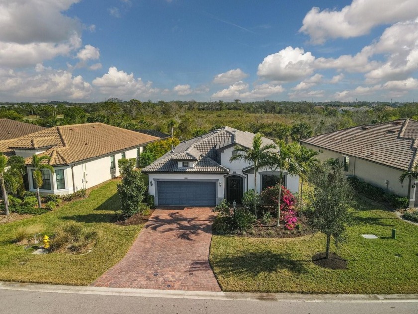 Nestled on a premium preserve lot, this impeccably maintained - Beach Home for sale in Lakewood Ranch, Florida on Beachhouse.com