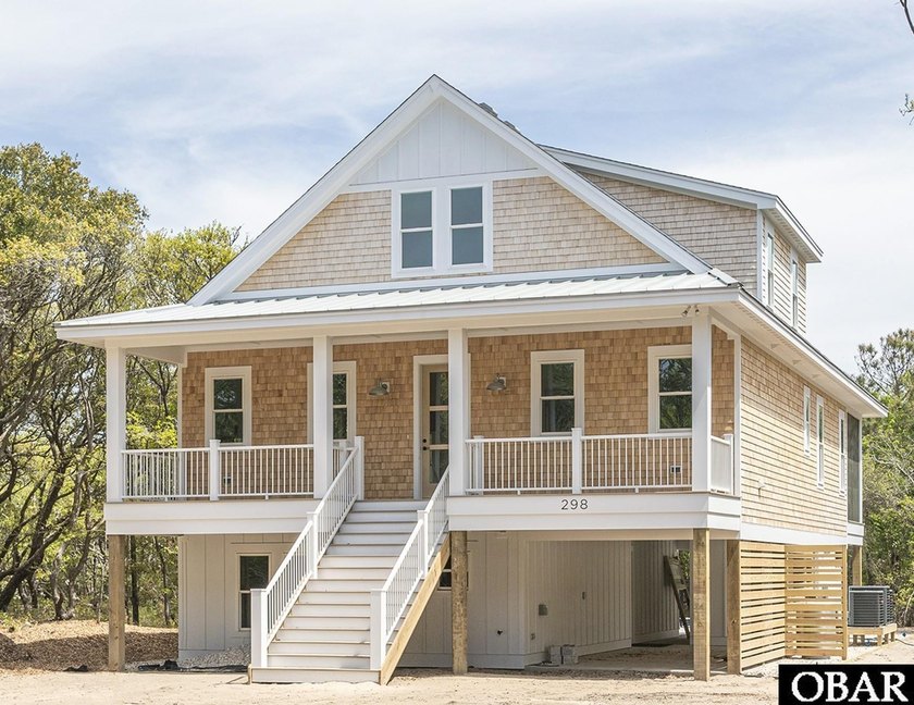 Nestled in the highly sought-after Sea Crest Village of Southern - Beach Home for sale in Southern Shores, North Carolina on Beachhouse.com