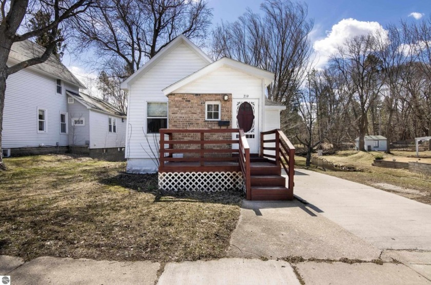 Discover the perfect blend of nature and city living in this - Beach Home for sale in Traverse City, Michigan on Beachhouse.com