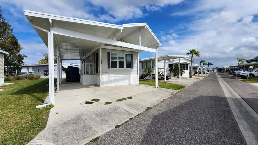 UPDATED SINGLE WIDE MOBILE HOME IN ACTIVE 55+ COMMUNITY! Stay - Beach Home for sale in Bradenton, Florida on Beachhouse.com