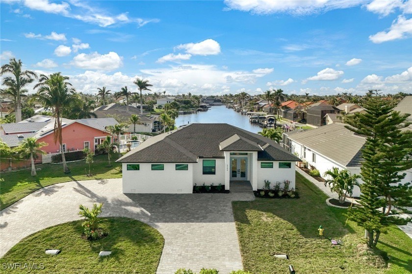 GULF ACCESS MODERN COASTAL NEW CONSTRUCTION! This stunning 2024 - Beach Home for sale in Cape Coral, Florida on Beachhouse.com