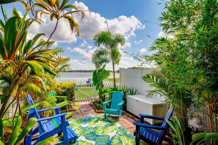Discover unparalleled lakeside living in this stunning 2-bedroom - Beach Townhome/Townhouse for sale in Tampa, Florida on Beachhouse.com