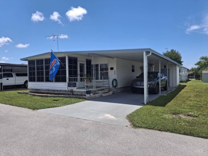 Beautifully updated home located in our 55+ gated community of - Beach Home for sale in New Port Richey, Florida on Beachhouse.com