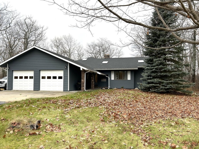 This is an enchanting ranch-style retreat, where elegance meets - Beach Home for sale in Presque Isle, Michigan on Beachhouse.com