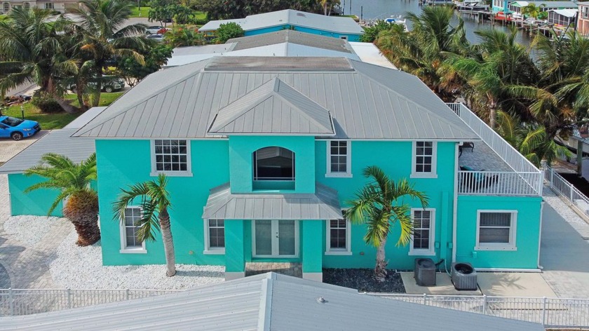 This house is a GEM. DEEP WATER dock and ocean access; boat lift - Beach Home for sale in Jensen Beach, Florida on Beachhouse.com