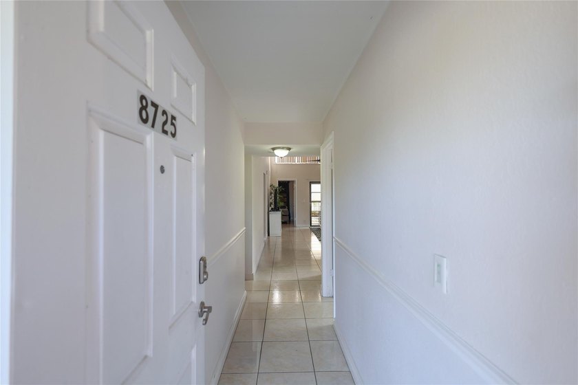 Bright corner 3-bedroom, 2-bath condo offering high ceilings - Beach Condo for sale in Coral Springs, Florida on Beachhouse.com