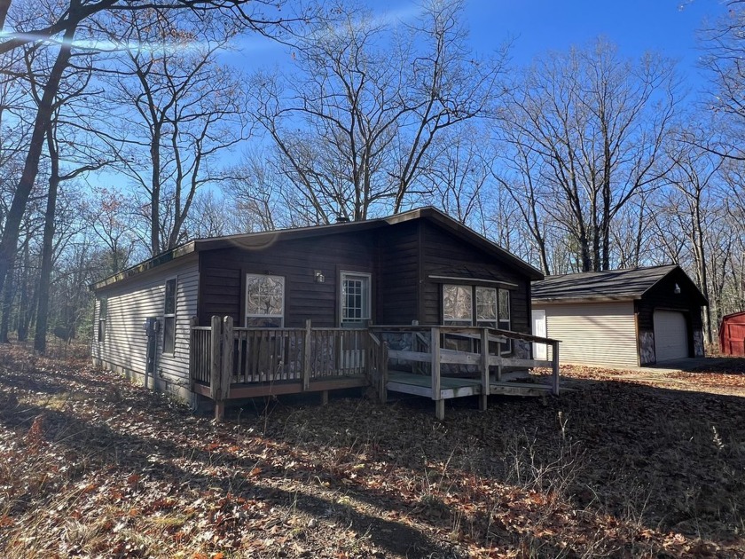 Nestled on 2.45 wooded acres, this charming 3-bedroom, 2-bath - Beach Home for sale in Rogers City, Michigan on Beachhouse.com