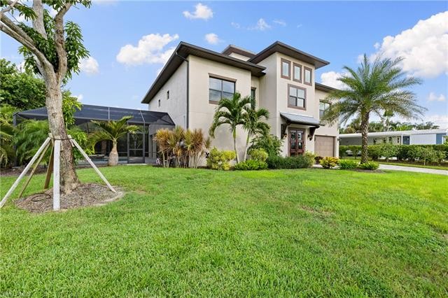 Situated on a desirable waterfront lot, you can enjoy access to - Beach Home for sale in Bonita Springs, Florida on Beachhouse.com