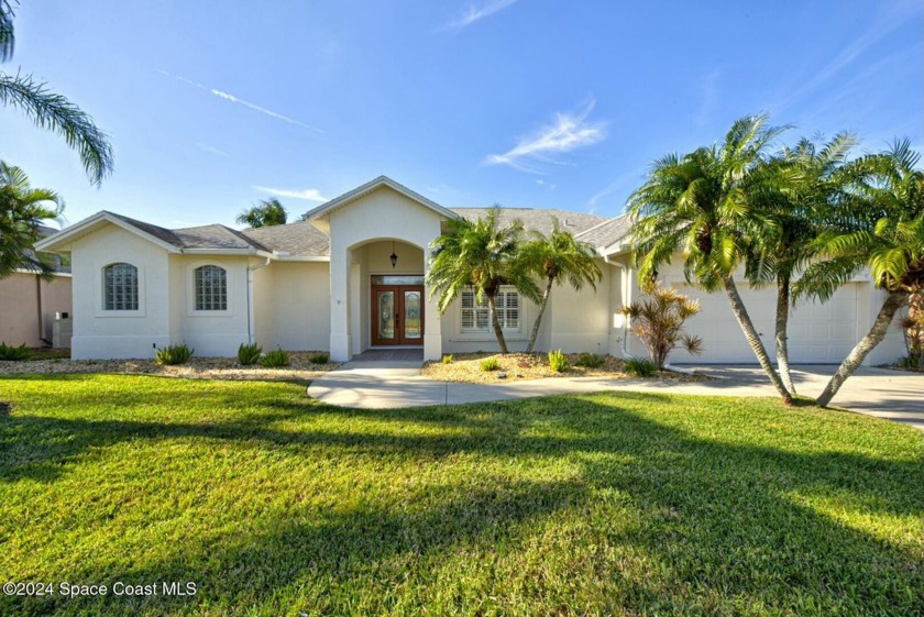 This exquisite waterfront home w/ gas heated; saltwater pool - Beach Home for sale in Merritt Island, Florida on Beachhouse.com