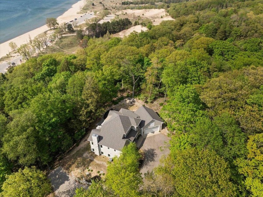 Welcome to the good Life. Nestled in the exclusive Dunegrass - Beach Home for sale in Saugatuck, Michigan on Beachhouse.com
