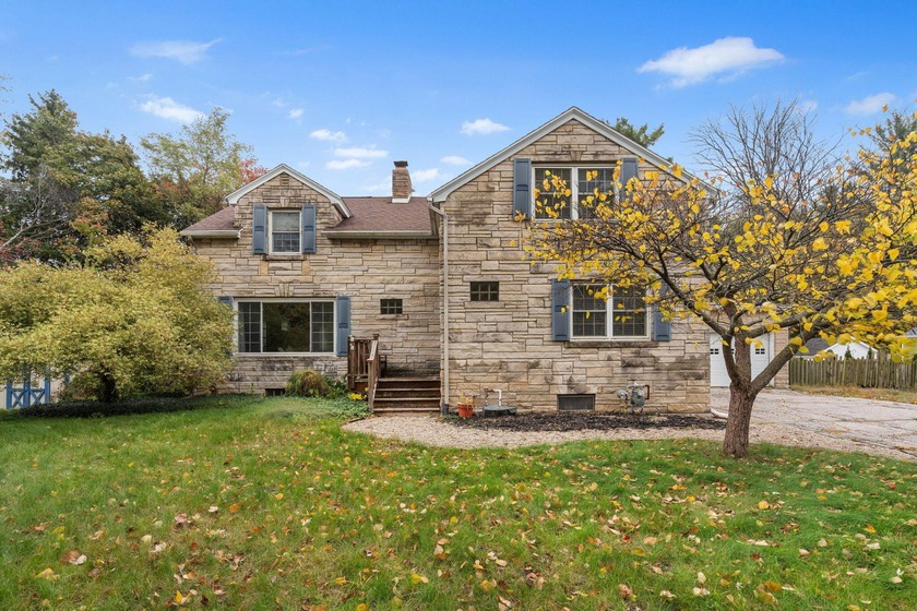 Step into timeless charm and storybook character of this - Beach Home for sale in Grand Haven, Michigan on Beachhouse.com