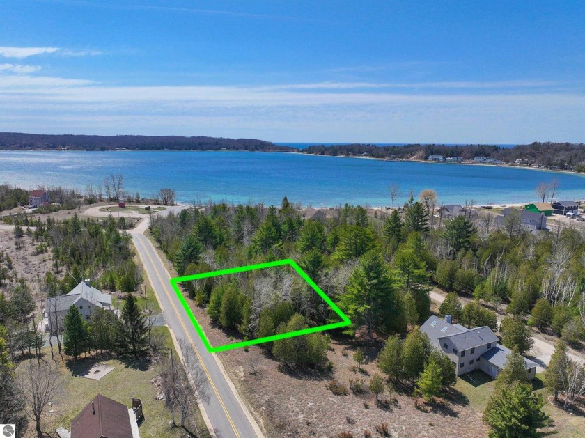 This serene, wooded lot offers the perfect blend of natural - Beach Lot for sale in Onekama, Michigan on Beachhouse.com