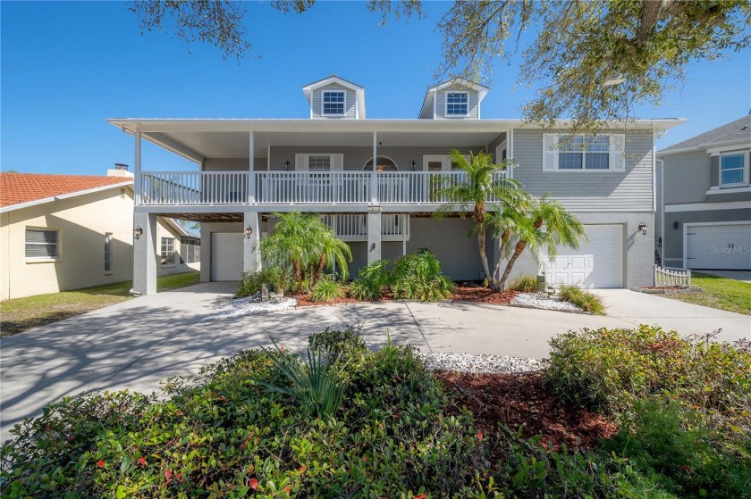This Key West style home is perfectly located for fun on the - Beach Home for sale in New Port Richey, Florida on Beachhouse.com