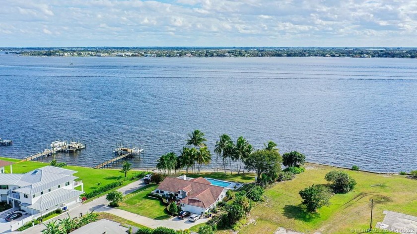 Breathtaking WIDE WATERFRONT home situated on .63 of an acre - Beach Home for sale in Jensen Beach, Florida on Beachhouse.com
