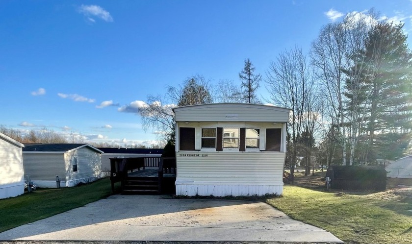 Meticulously cared-for 2-bedroom mobile home just minutes from - Beach Home for sale in Alanson, Michigan on Beachhouse.com