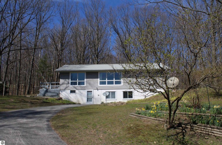 A tranquil location and SEVEN acres with a view!  This - Beach Home for sale in Frankfort, Michigan on Beachhouse.com