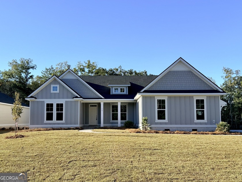 UNDER CONSTRUCTION AND NEARLY COMPLETE! THIS FOUR-BEDROOM - Beach Home for sale in Saint Marys, Georgia on Beachhouse.com