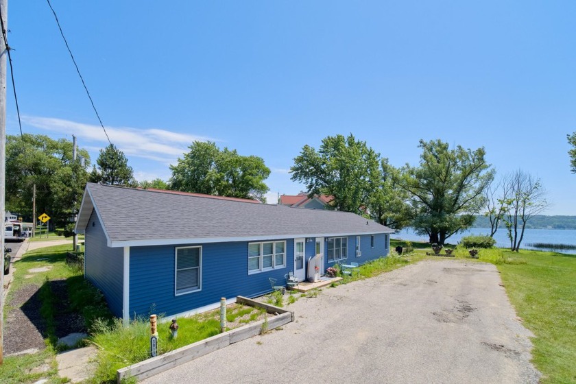 Wow! You really can have it all! Rental income plus a place for - Beach Lot for sale in Onekama, Michigan on Beachhouse.com