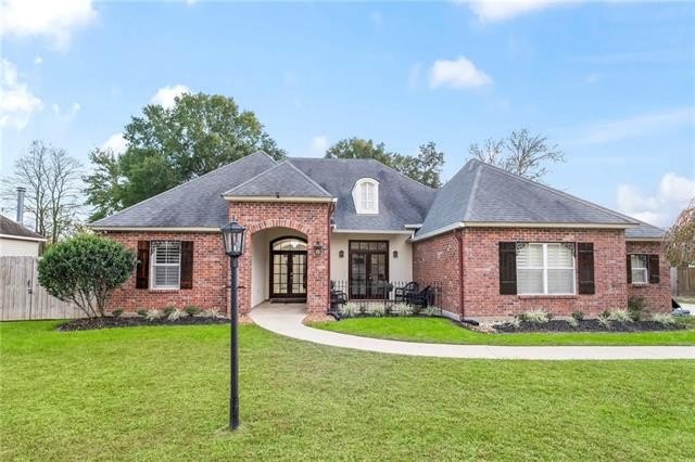 Tucked on a quiet street in the heart of Forest Brook, this - Beach Home for sale in Mandeville, Louisiana on Beachhouse.com