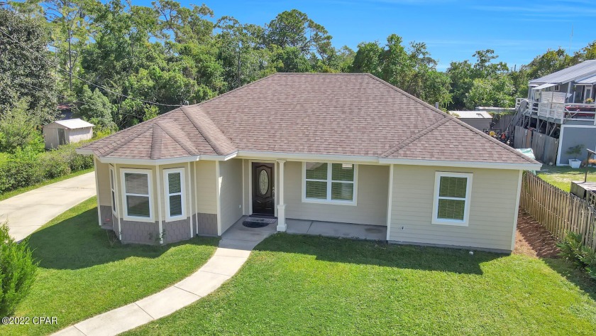 Looking for a home conveniently located just over a mile from - Beach Home for sale in Panama City Beach, Florida on Beachhouse.com