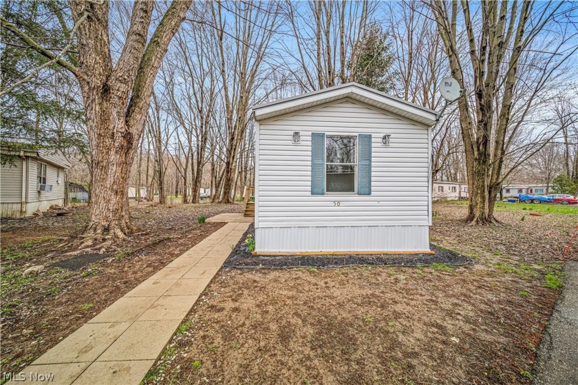 Welcome to your newly renovated sanctuary! This charming - Beach Home for sale in Geneva, Ohio on Beachhouse.com