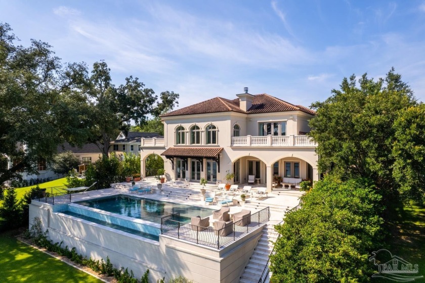 Experience the epitome of Mediterranean-inspired opulence with - Beach Home for sale in Pensacola, Florida on Beachhouse.com