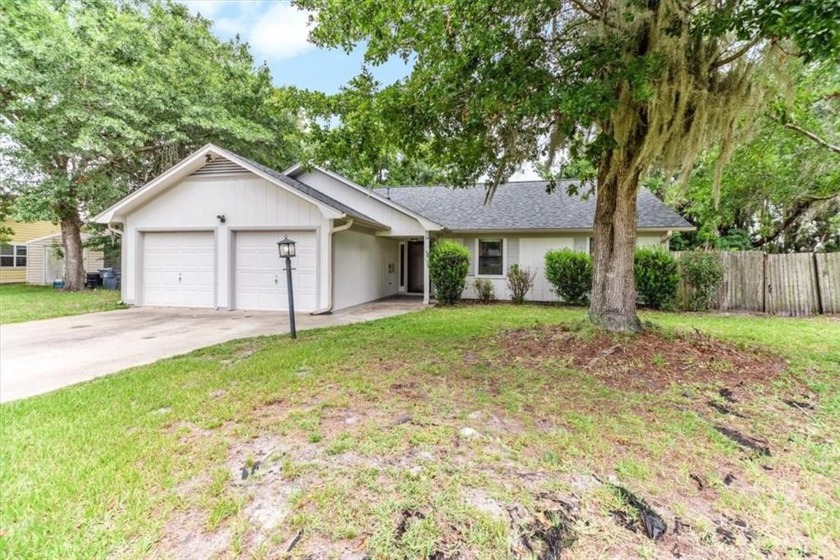 This quaint four bedroom, two bath home is tucked away in the - Beach Home for sale in Saint Marys, Georgia on Beachhouse.com
