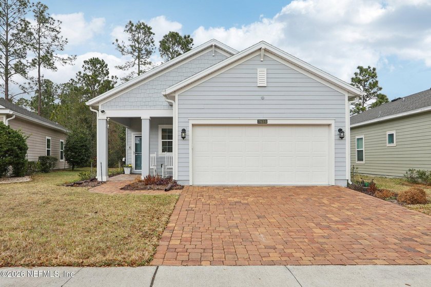 This immaculate former model home showcases premium upgrades in - Beach Home for sale in Jacksonville, Florida on Beachhouse.com