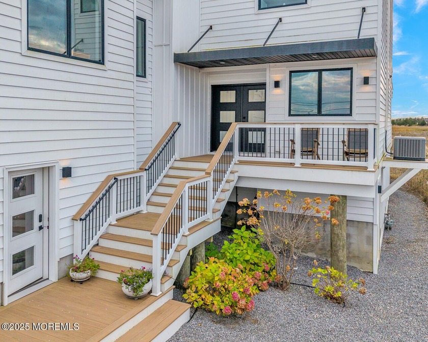 Experience the best of luxury waterfront living in this stunning - Beach Home for sale in West Creek, New Jersey on Beachhouse.com