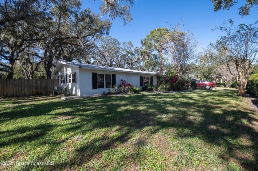 Stretch out on  1/3  acre in Royal Gardens, where mid-century - Beach Home for sale in Vero Beach, Florida on Beachhouse.com