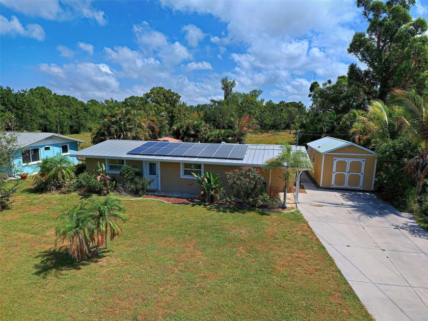 GREAT LOCATION!  This home is equipped with SOLAR PANELS, TANK - Beach Home for sale in Englewood, Florida on Beachhouse.com